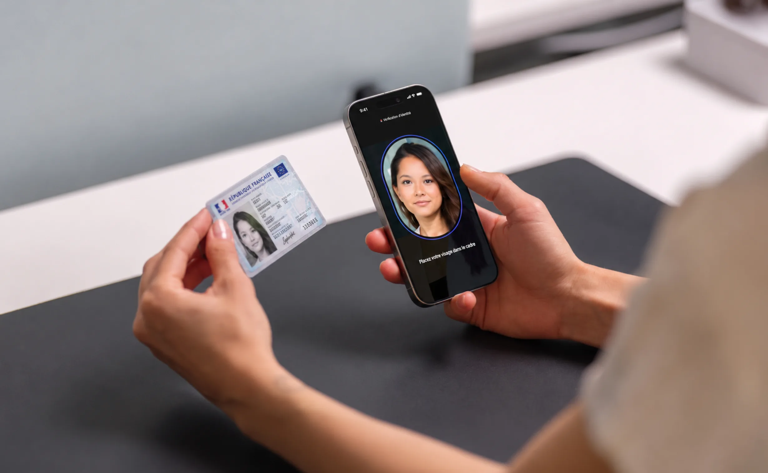 A person using the AR24 identity verification flow while holding an identity document